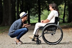 NDIS support workers finding empowering people in wheelchairs fulfilling
